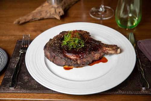 Steak with miso demi-glace and black garlic butter from Bellevue steakhouse