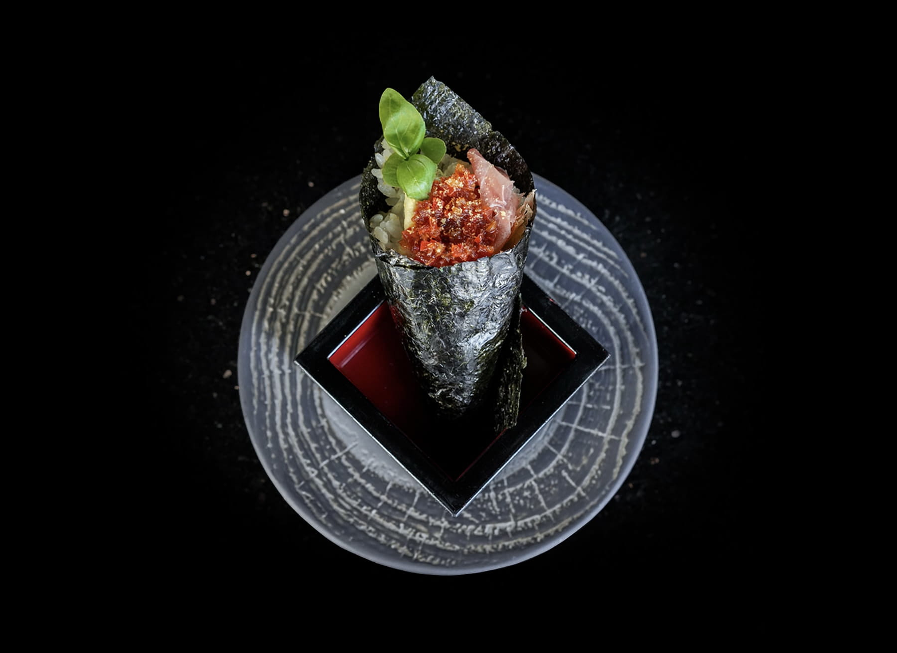 Spicy tuna hand roll with prosciutto from high-end Bellevue sushi restaurant