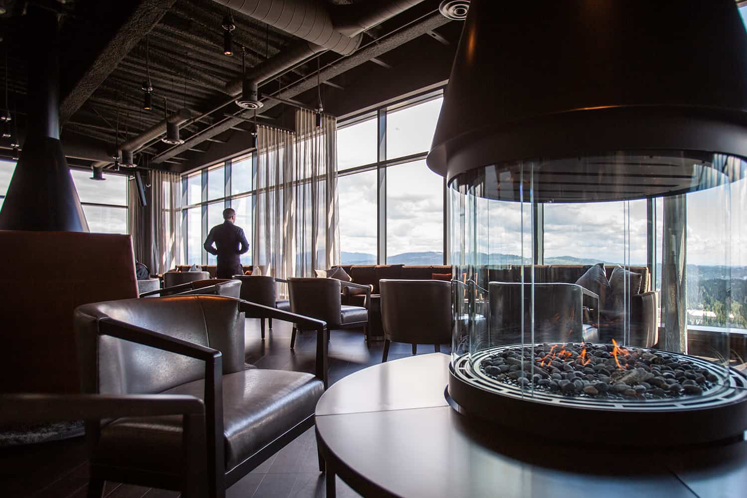 Bellevue restaurant lounge with fireplaces and comfortable chairs for happy hour