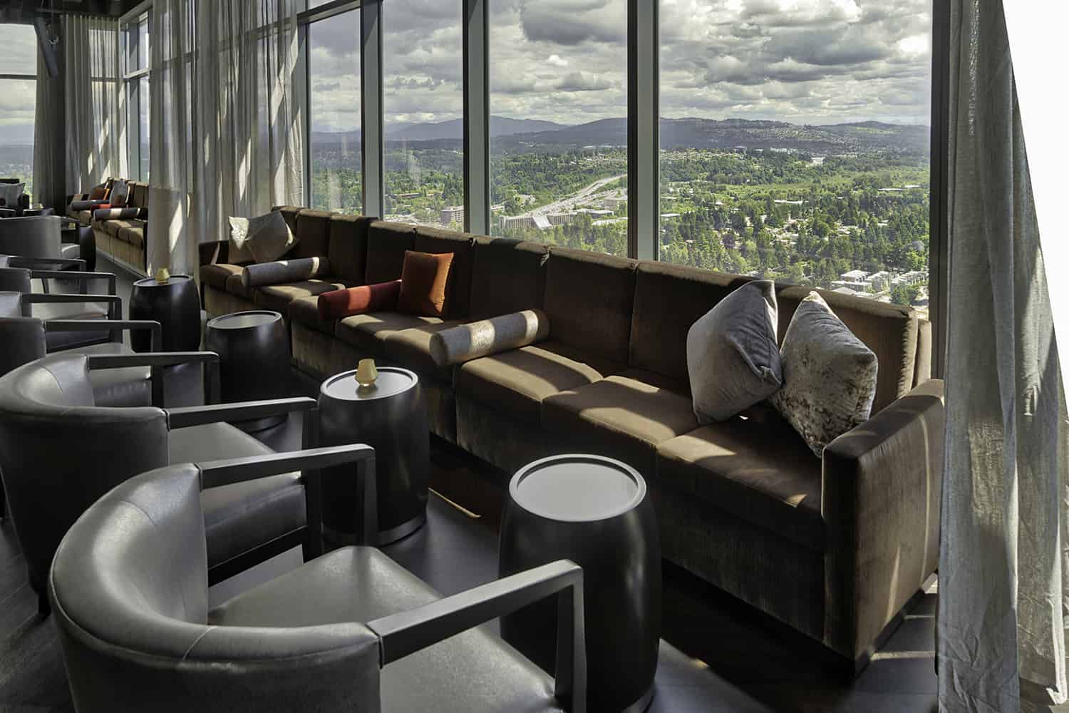 Bellevue restaurant lounge with view of Bellevue, WA wilderness serving steak and sushi