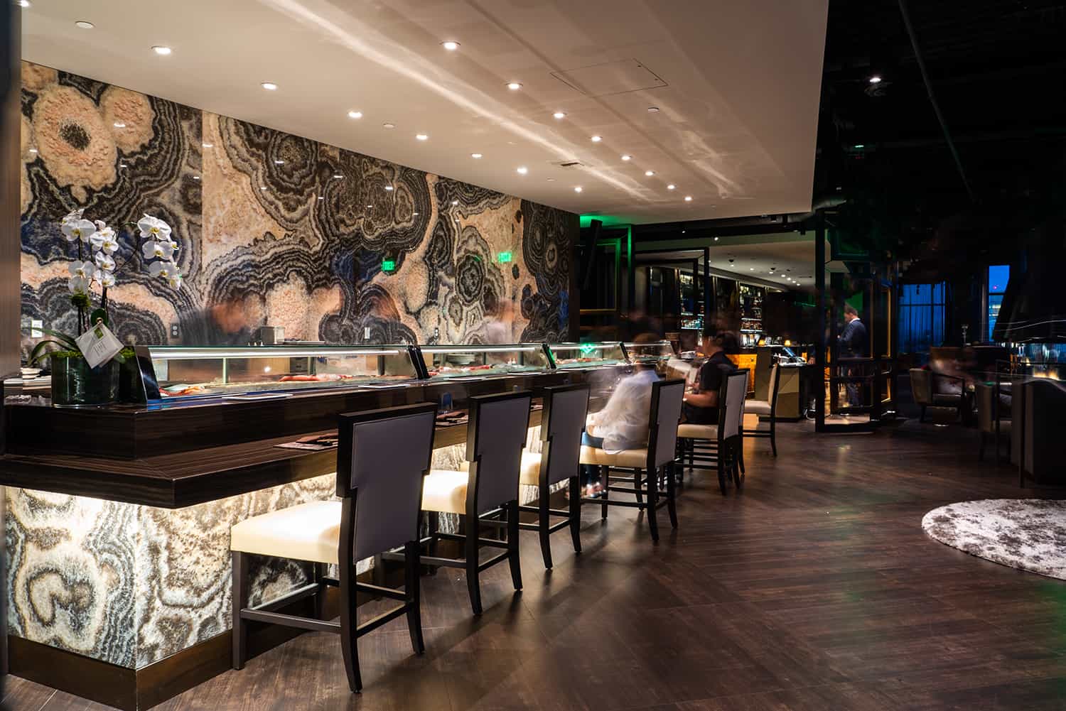 Bellevue sushi bar in steakhouse with chefs preparing craft sushi rolls