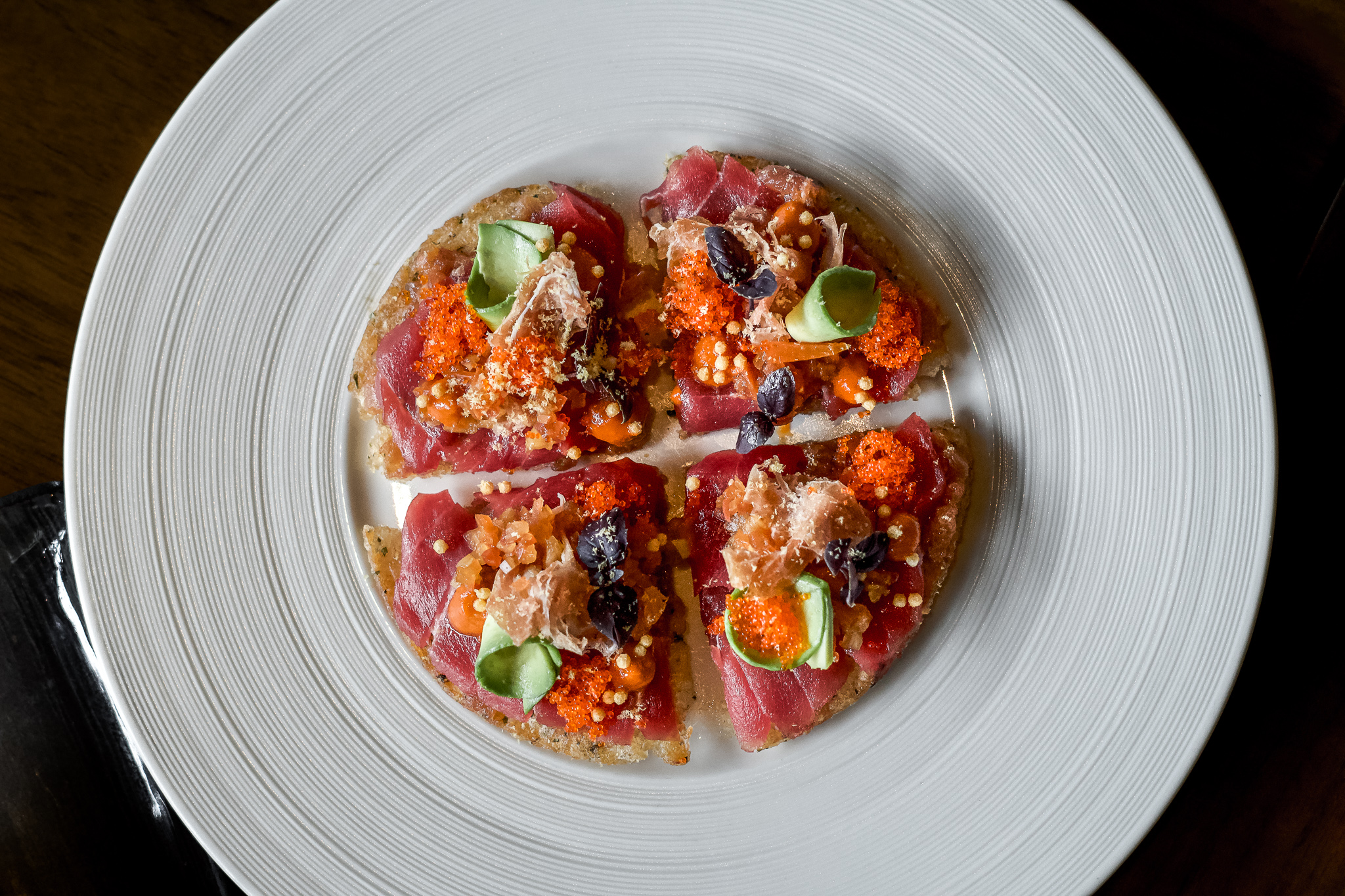 Spicy tuna prosciutto pizza from brunch menu of Bellevue sushi bar and steakhouse