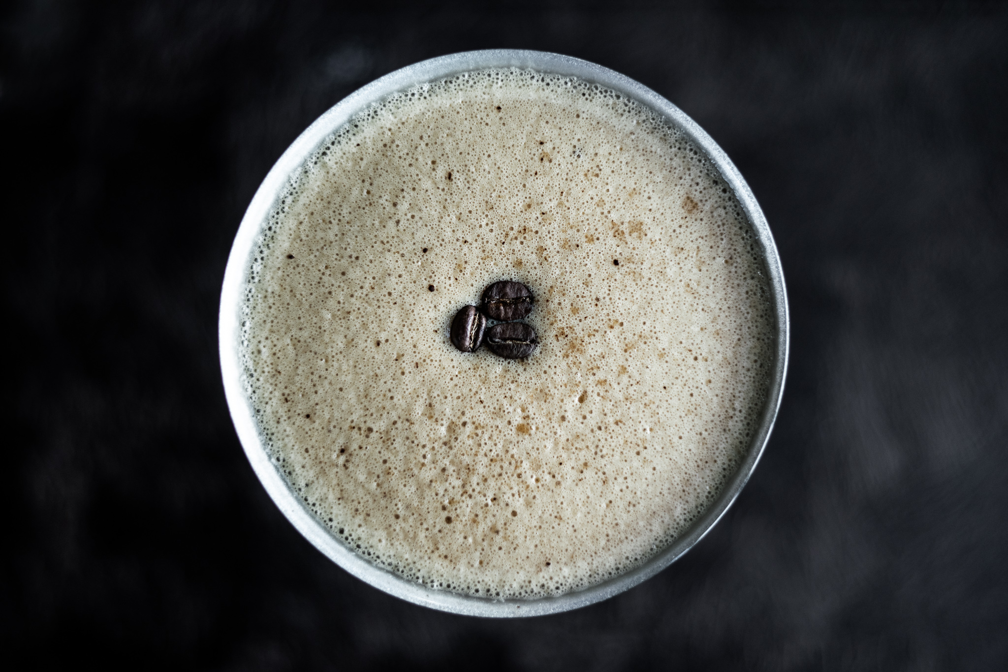 Cappuccino with coffee bean garnish to pair with fine dining desserts at Bellevue restaurant